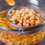 May-2026-Phone-Sex-Mistress-Sascha-800-601-6875-Chickpeas-in-Seive and Glass-Container