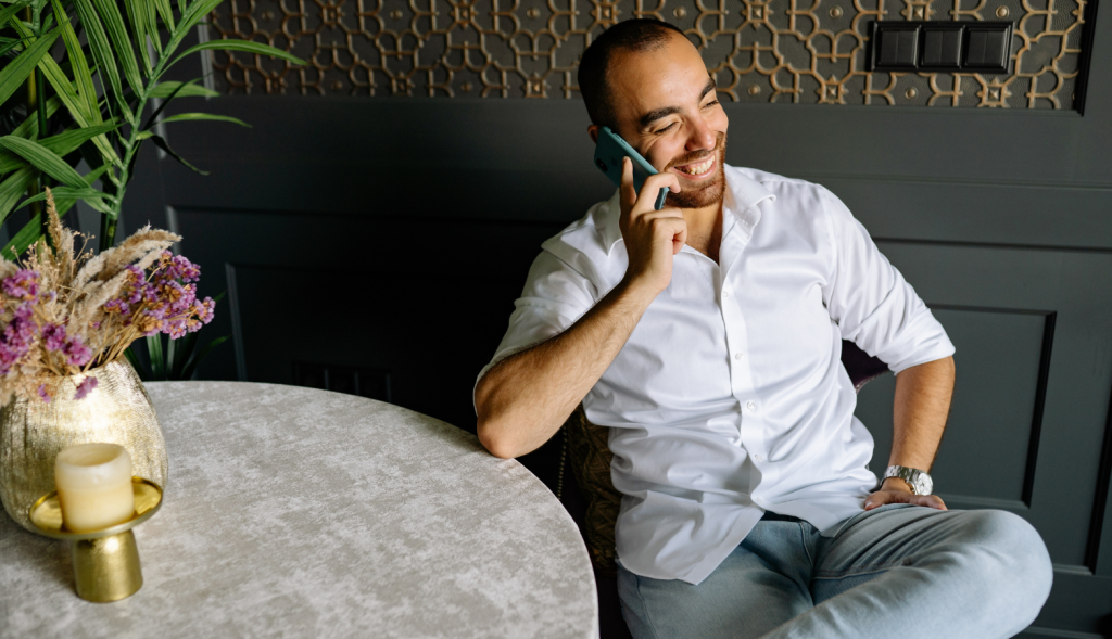 Phone-Sex-Mistress-Sascha-800-601-6875-Phone-Sex-Company-Man-On-Phone Man on phone chatting and enjoying one of the many benefits of calling a Phone Sex Company.